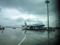 Riding on China Airlines jumbo of (B747-400) to Taipei Taoyuan International Airport